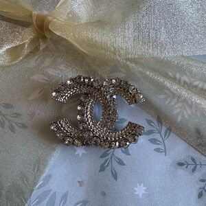 Elegant Silver Iconic Crystal Brooch